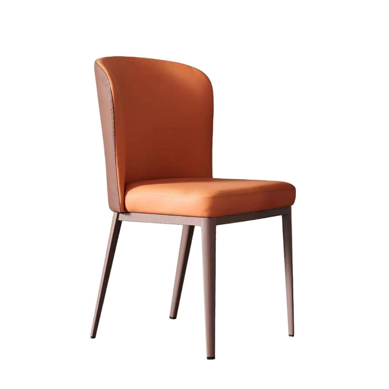 A stylish chair featuring a rich cinnamon hue on both the seat and the curved backrest, supported by dark metallic frames