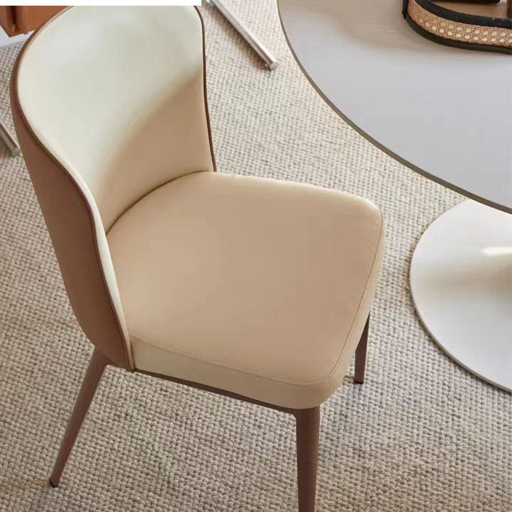 A stylish chair featuring a rich cinnamon hue on both the seat and the curved backrest, supported by dark metallic frames