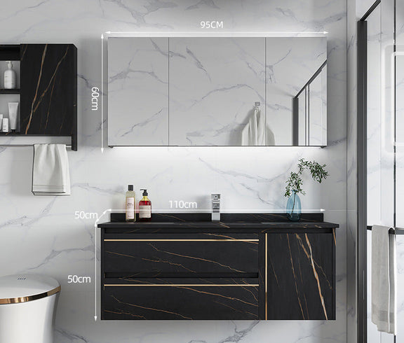 Modern black bathroom furniture with gold accents and smart lighting