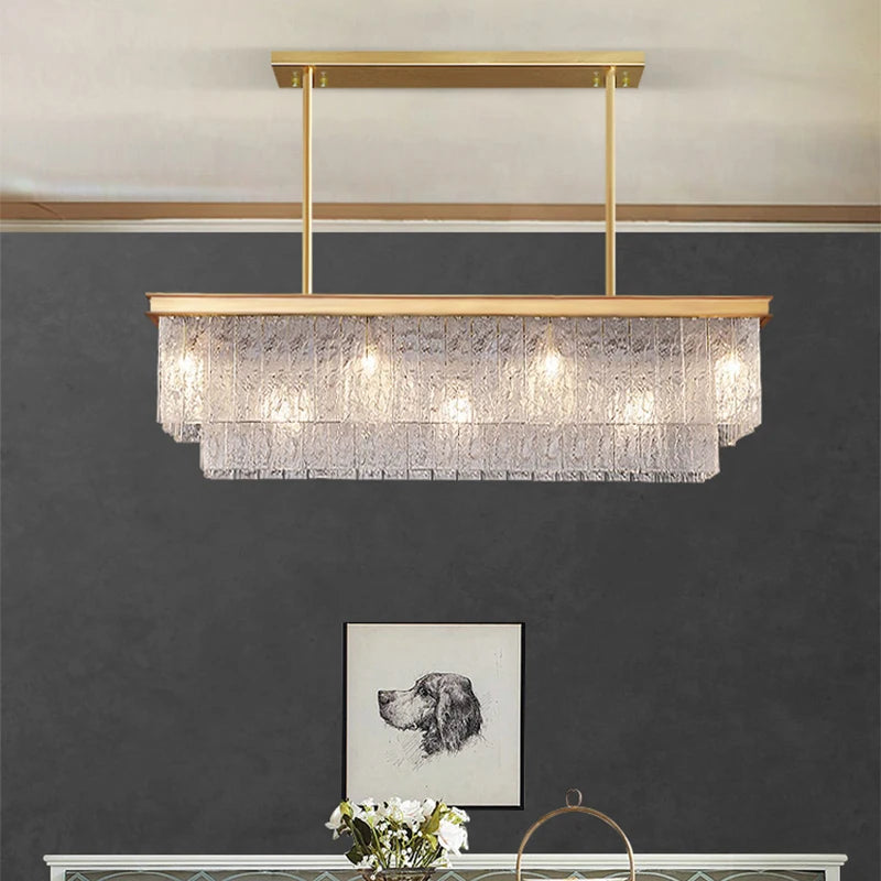 Contemporary tiered glass LED chandelier suspended from ceiling