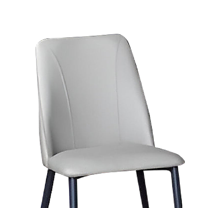 A sophisticated chair featuring a smooth, slate-gray upholstery and slim, metallic legs