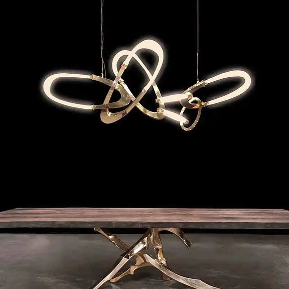 Modern designer pendant light with twisted ring design