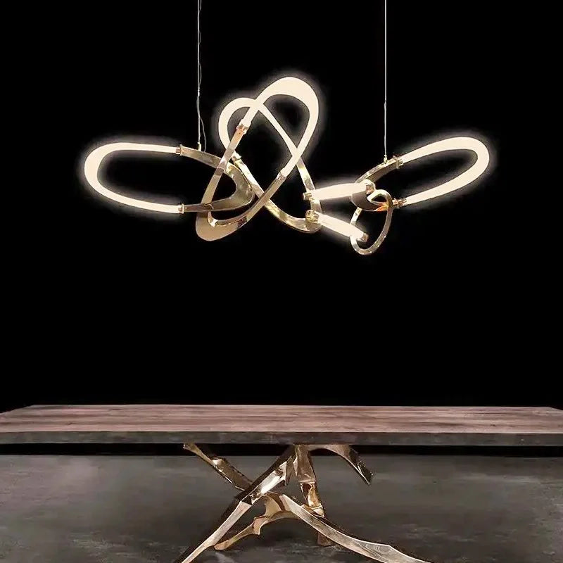 Modern designer pendant light with twisted ring design