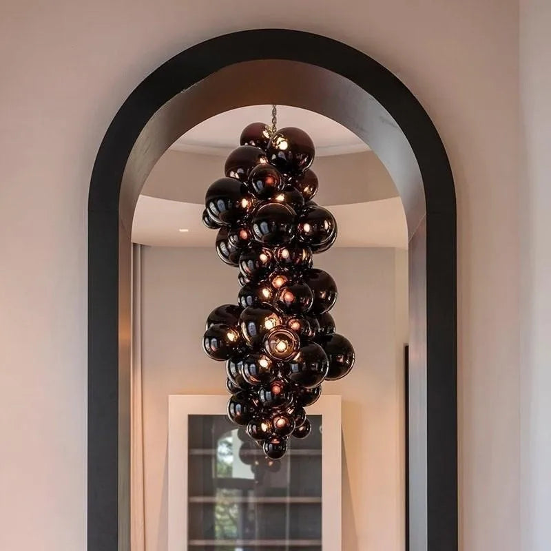 Purple grape-cluster chandelier with glossy glass spheres