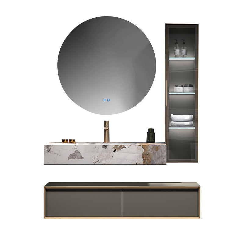 Minimalist stainless steel bathroom unit with stone slab countertop