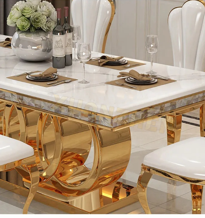 light luxury dining table set featuring a rectangular design. This  sleek marble tabletop with durable stainless steel legs, complemented by matching chairs for a refined and modern dining experience