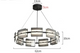 Round smoked glass pendant light for dining space